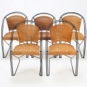 A set of five cantilever chairs made of painted iron and wicker, 1950s (5)