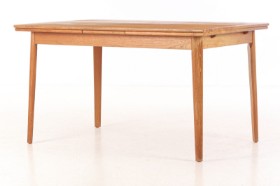 Danish furniture manufacturer. Teak dining table with Dutch extension