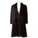 Long coat made of dark brown mink, approx. size L.