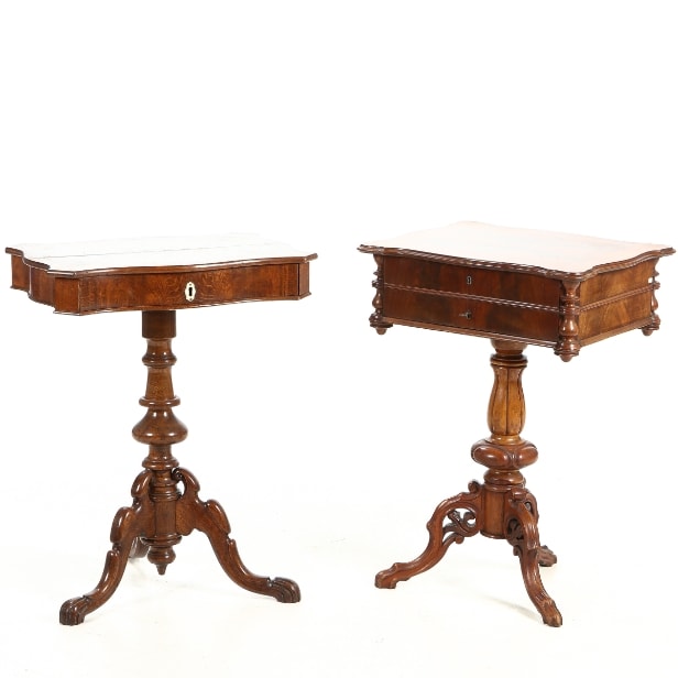 Two sewing tables of mahogany and dark stained wood, late 19th century. (2)