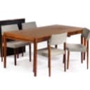 Danish furniture manufacturer. Rosewood dining table with 4 chairs (8)