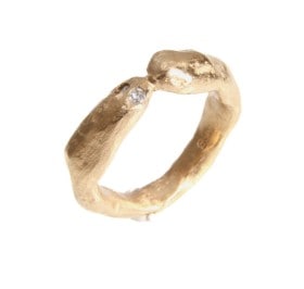 Ring af 14 kt. guld, i alt ca. 0.02 ct.