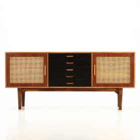 Unknown furniture manufacturer. Low sideboard L. 180 with colored drawers and French wicker