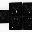 A collection jewellery sets of gold-plated sterling silver. (63)