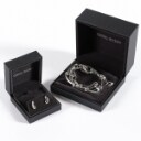 Georg Jensen. 'Infinity' necklace & earrings made of sterling. (2)