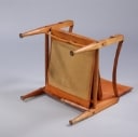 Kaare Klint. Safari chair with seat cushion in cognac leather.
