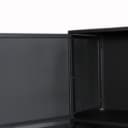 Display cabinet in black painted perforated metal.