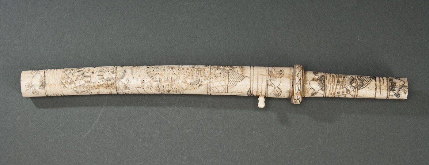 Japanese knife with carved bone handle and sheath, 19th century