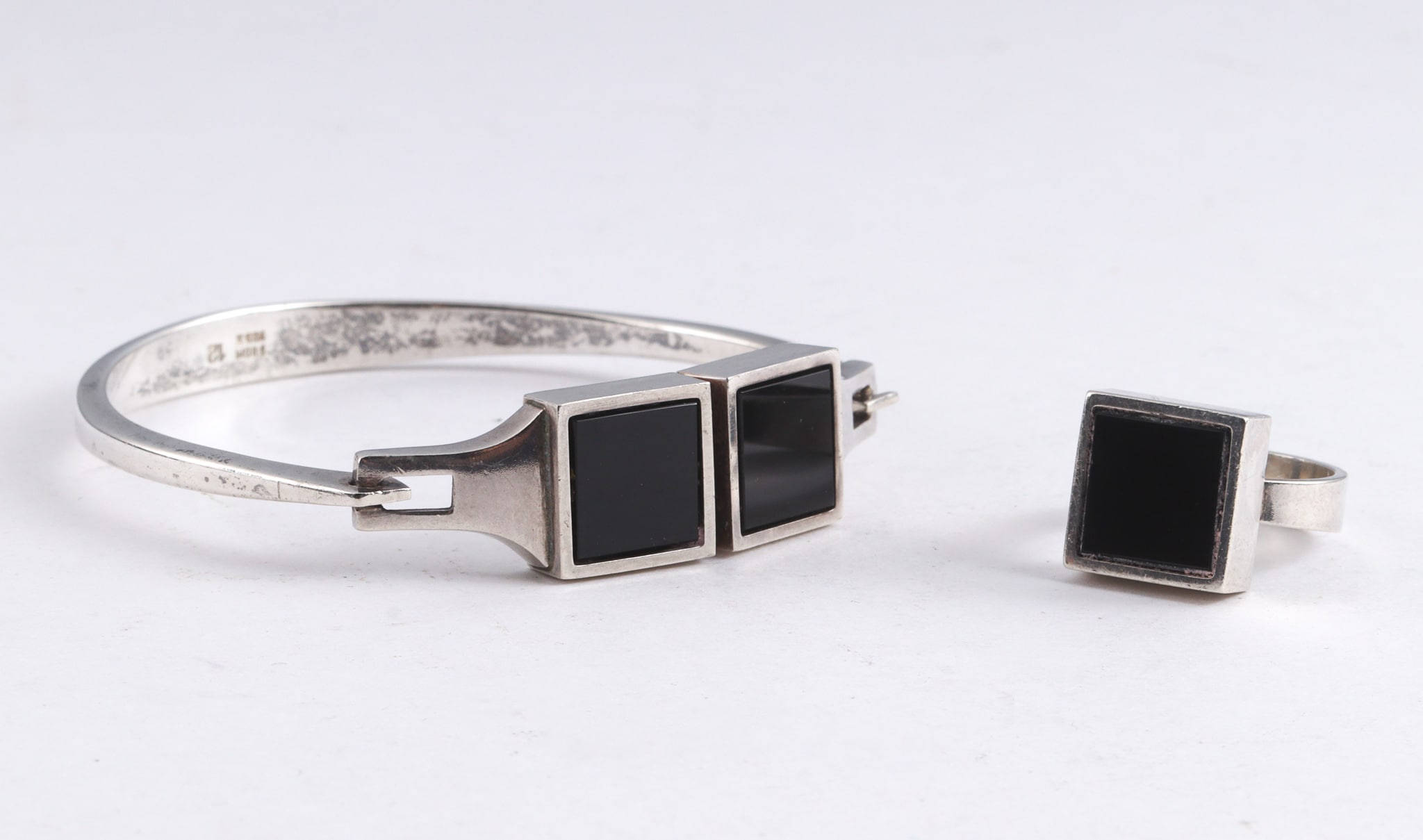 N. E. From. Sterling silver and black onyx bangle and ring (2)