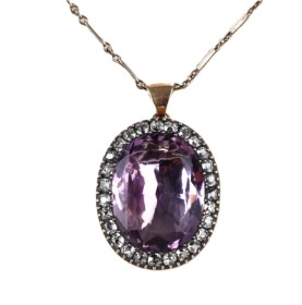 An amethyst and diamond pendant of 14k gold and silver. 19th century.