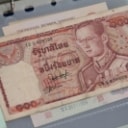 Collection of banknotes in folder, including Russia and France (142)