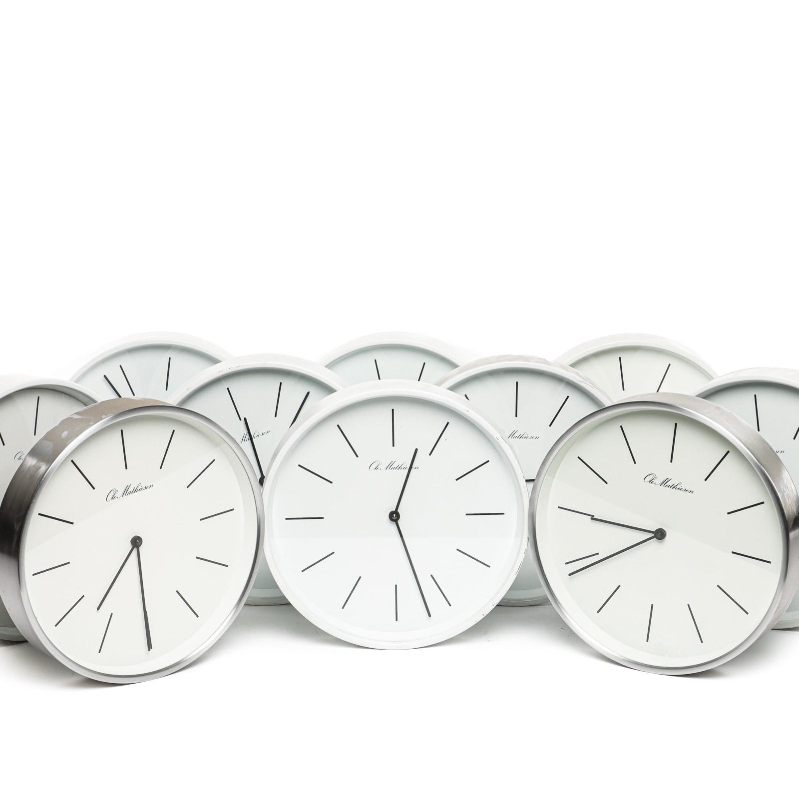 Ole Mathiesen. Ten wall clocks (10) | Lauritz.com