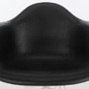 Charles Eames. Model DAR. armchair, black and white