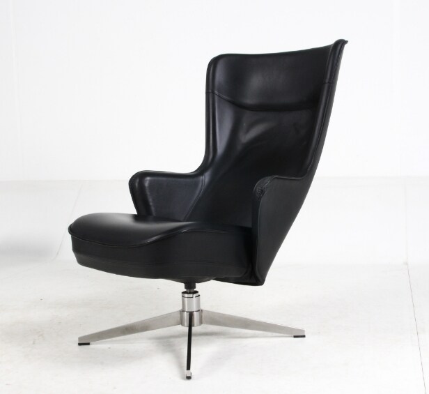 Roger Persson for Swedese. High-backed armchair and stool (2)
