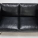 Marstrand from Ilva: Two-seater sofa in black leather.