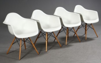 Ray & Charles Eames. Four armchairs, model DAW (4)