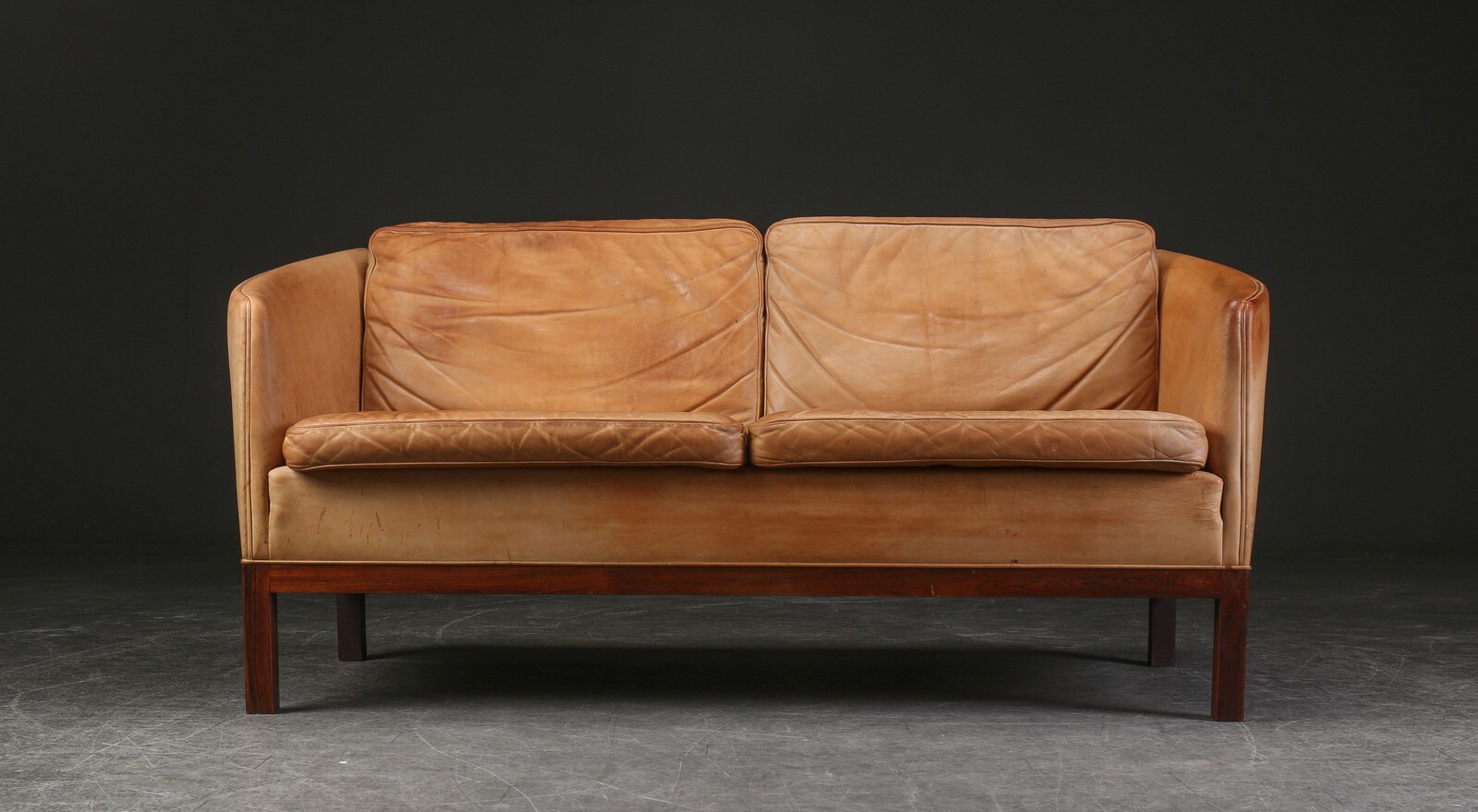 Illum Wikkelsø for Holger Christiansen. Two-seater sofa, rosewood and