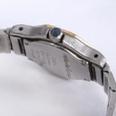 Cartier. 'Santos Octagon' damearmbåndsur af 18 kt. guld og stål