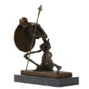 Bronze sculpture, fighting skeleton warrior.