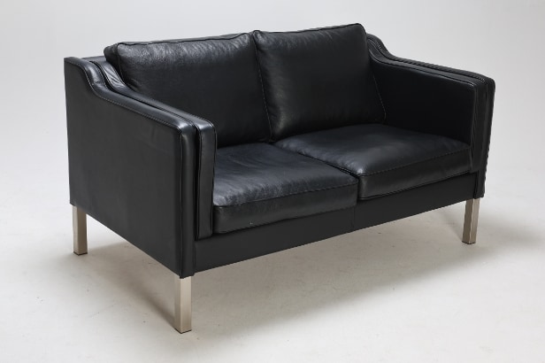 Marstrand from Ilva: Two-seater sofa in black leather.