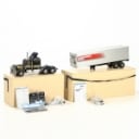 Tamiya. 56336 King Hauler truck, 56302 Semi-Trailer trailer + Carson Reflex Stick 2 remote control, in transport boxes. (2)