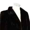Short coat made of mahogany-colored mink. Approx. size M.