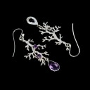 Earrings in rhodium-plated Sterling silver adorned with numerous amethysts.