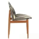 Danish furniture manufacturer 1950/60s: Oak chair with shell-shaped seat and back