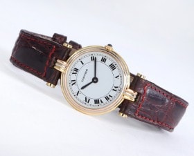 Cartier 'Trinity Vendome'. Dameur i 18 kt. trefarvet guld med lys skive, ca. 1990'erne