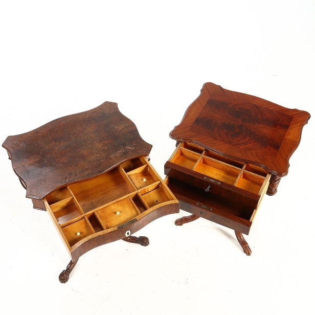 Two sewing tables of mahogany and dark stained wood, late 19th century. (2)