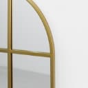 Mirror with curved top, gold-colored iron frame. 125x85 cm