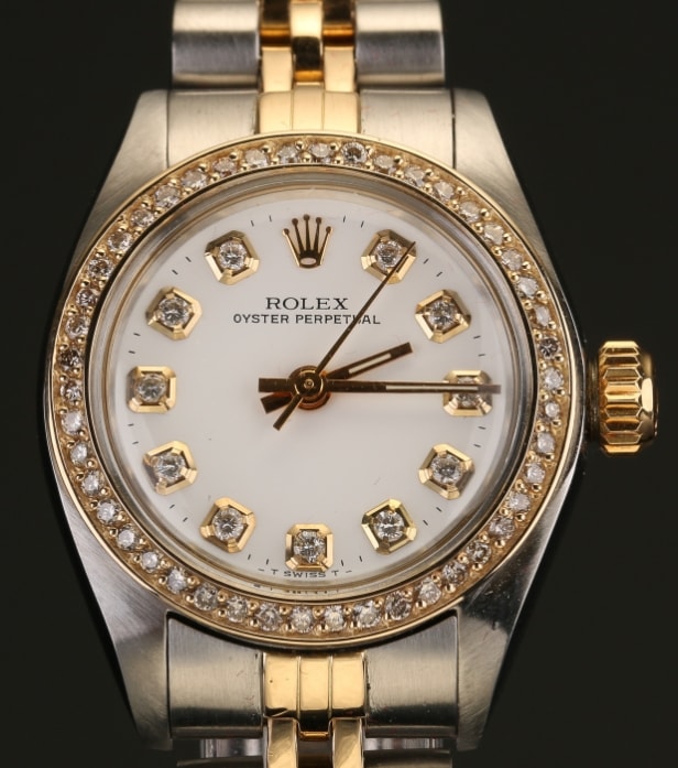 Rolex dameur i 18 karat guld/stål med Diamanter