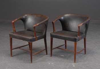 Stig Thoresen-Lassen. Two armchairs with rosewood frames. (2)