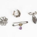 Hans Hansen a.o.: A jewellery collection of silver. (8)