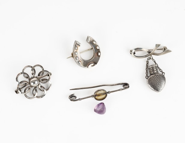 Hans Hansen a.o.: A jewellery collection of silver. (8)