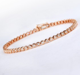 English tennis bracelet of 18 kt. rose gold, total 1.00 ct.