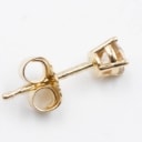 A natural brilliant earring made of 14 kt gold 0.16 ct