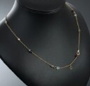 Marianne Dulong. 'Piccolo' halskæde i 18 kt guld m/ ædelsten.