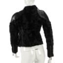 Short jacket made of astrakhan fur. size 36