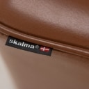 Skalma. Wing chair and armchair, cognac-colored leather. (2)
