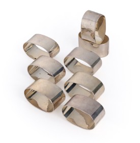 A set of contemporary sterling silver napkin rings (8)