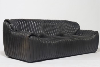 Annie Hieronimus. Ligne Roset three-seater sofa in black leather