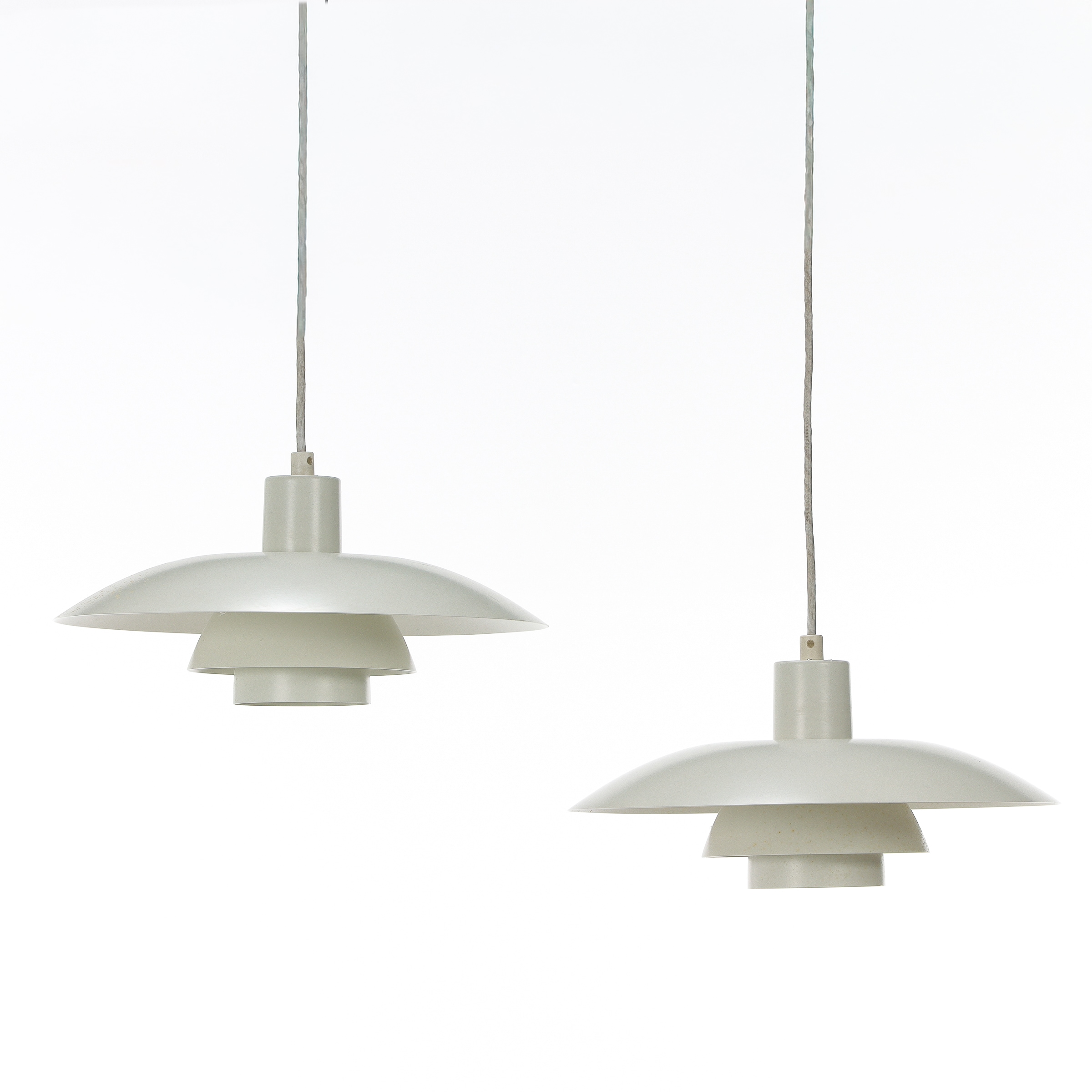 Poul Henningsen. A pair of PH4/3 pendants. (2)