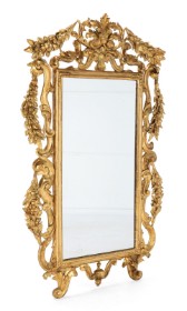 Large rococo mirror in a frame of gilded, pierced wood. 17/18 century.