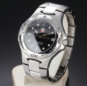 TAG Heuer 'Professional'. Men's watch in steel with black dial with date, 2000s