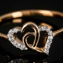 Diamonds by Frisenholm. Heart ring of 9 kt gold
