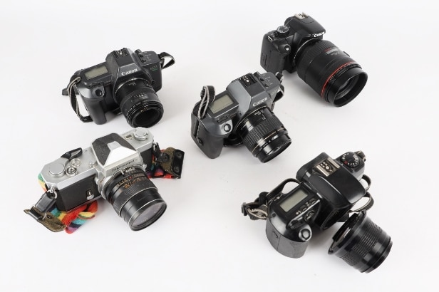 Canon, Nikkormat and others: A collection of cameras