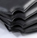 Cushion set for Hans J. Wegner's Y-chair. CH24, set of four reversible cushions, upholstered in black leather. (4)