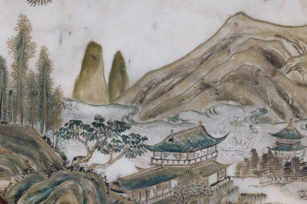 Chinese two-sided porcelain painting mounted in a carved wooden frame on a foot
