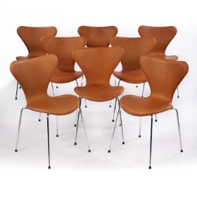 Arne Jacobsen. A set of eight chairs 'Syveren', model 3107, Vacona cognac aniline leather. New seat height 46.5 cm. (8)